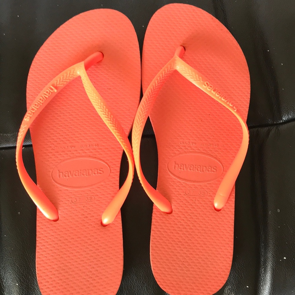 Neon orange Havaianas flip flops